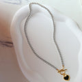 Black And White Double-sided Heart Necklace